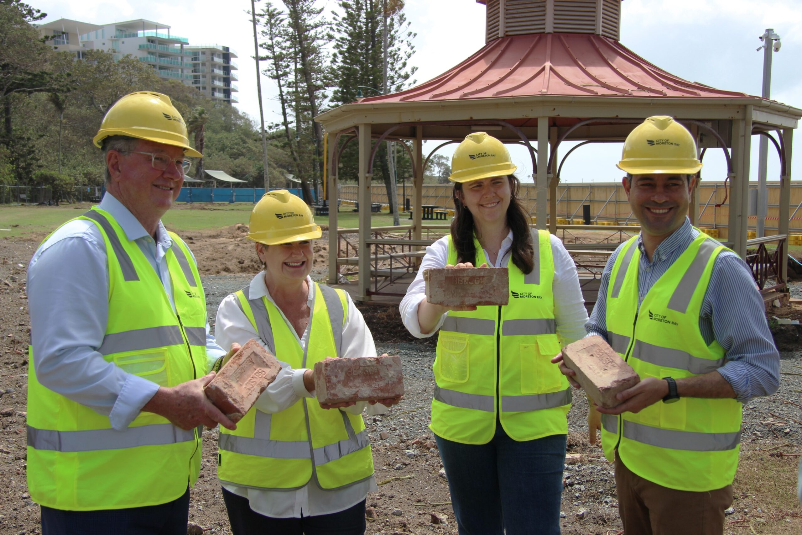 dirt ... (L-R) Moreton Bay Peter Flannery, Redcliffe MP Kerri-Anne Dooley, Federal MP for Petrie Emma Cromer and councillor Karl Winchester with historic bricks that will be reused in the new project. Photo: ANDREW KACIMAIWAI