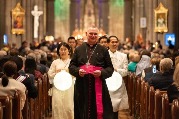 Archbishop Peter Comensoli leads a procession in St Patricks Cathedral, Melbourne. Photo: Casamento Photography.