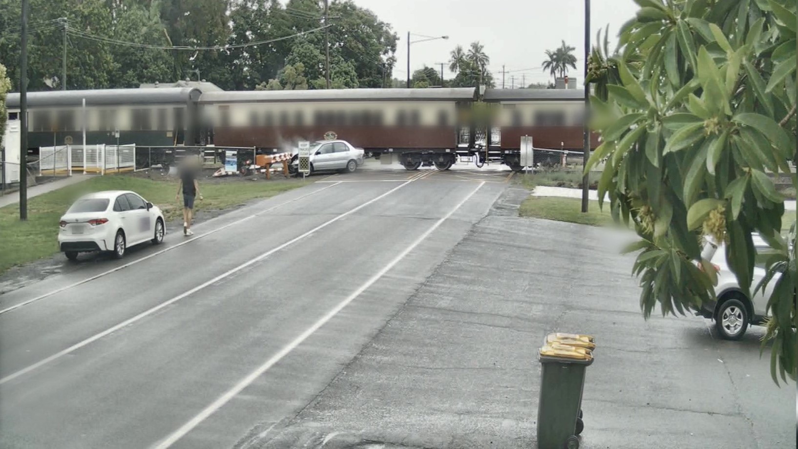 A screen capture of the Grove Street collision from video footage released by Queensland Rail.