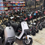 10,000 e-bikes due to go to auction in Qld while police investigate fatal crash