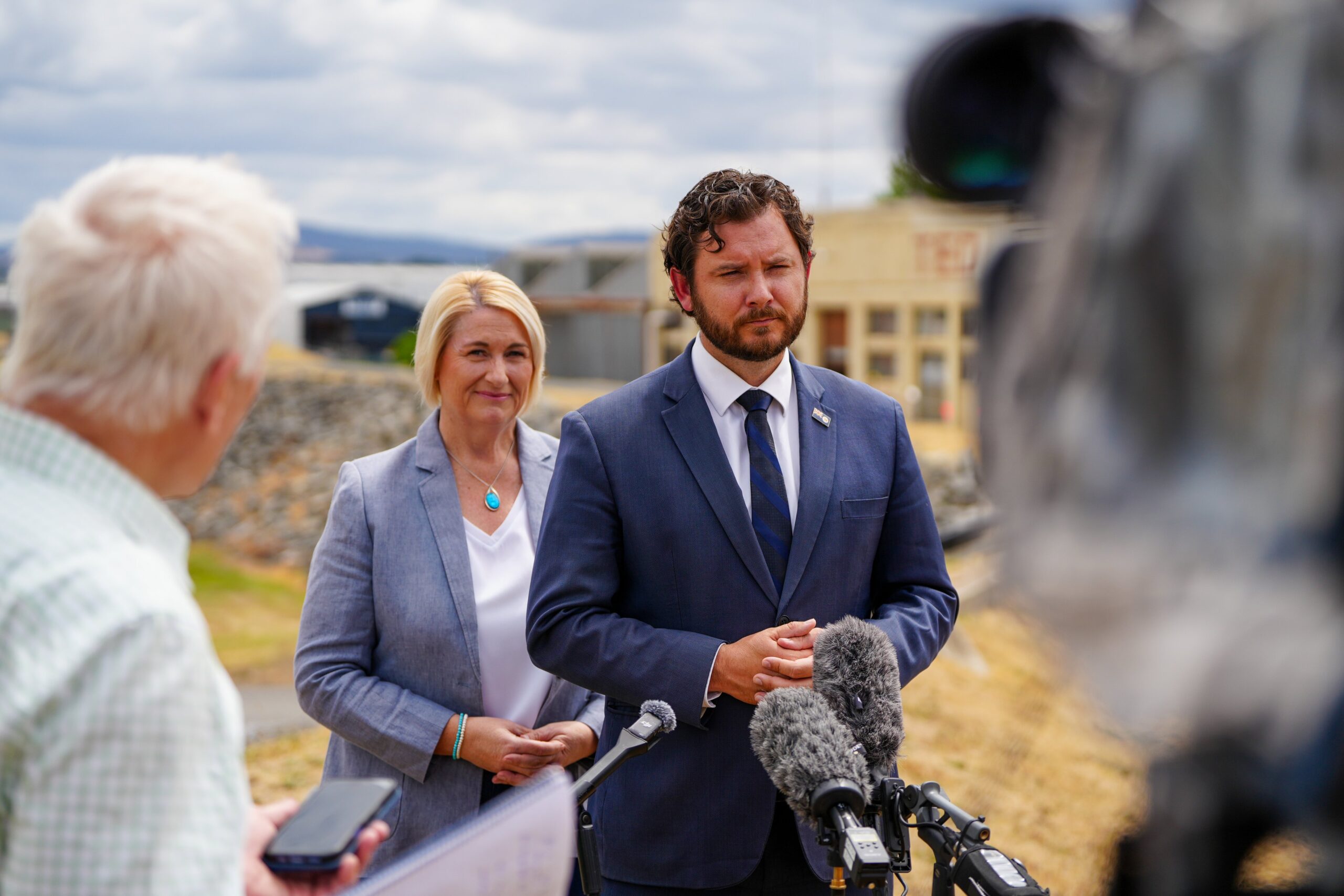 Tasmanian Industry Minister Felix Ellis announces the takeover of Liberty Bell’s ore stockpile in January. Photo: RockliffTeamMedia/Twitter (X)