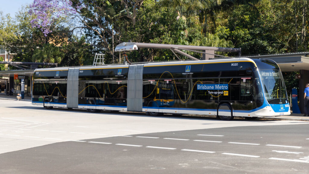 The 64-seat electric Metro bus seen charging at the UQ Lakes station. Photo: Brisbane City Council