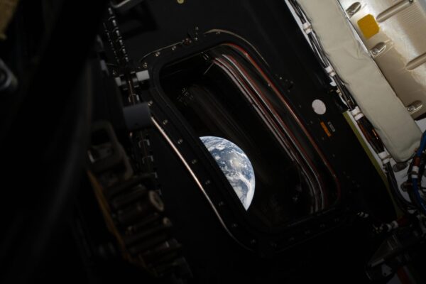 The Earth as seen from a main window onboard the Orion on its way to the moon. Image: NASA.
