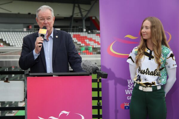 Moreton Bay Mayor Peter Flannery and outfielder Nicole Connacher. Photo: ANDREW KACIMAIWAI
