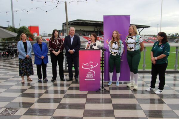 The group of council, politicians and softball officials and players at the stadium. Photo: ANDREW KACIMAIWAI