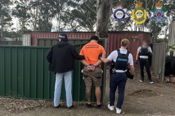 Two have been arrested over a record cocaine haul seized at a western Sydney property. Photos: AFP.