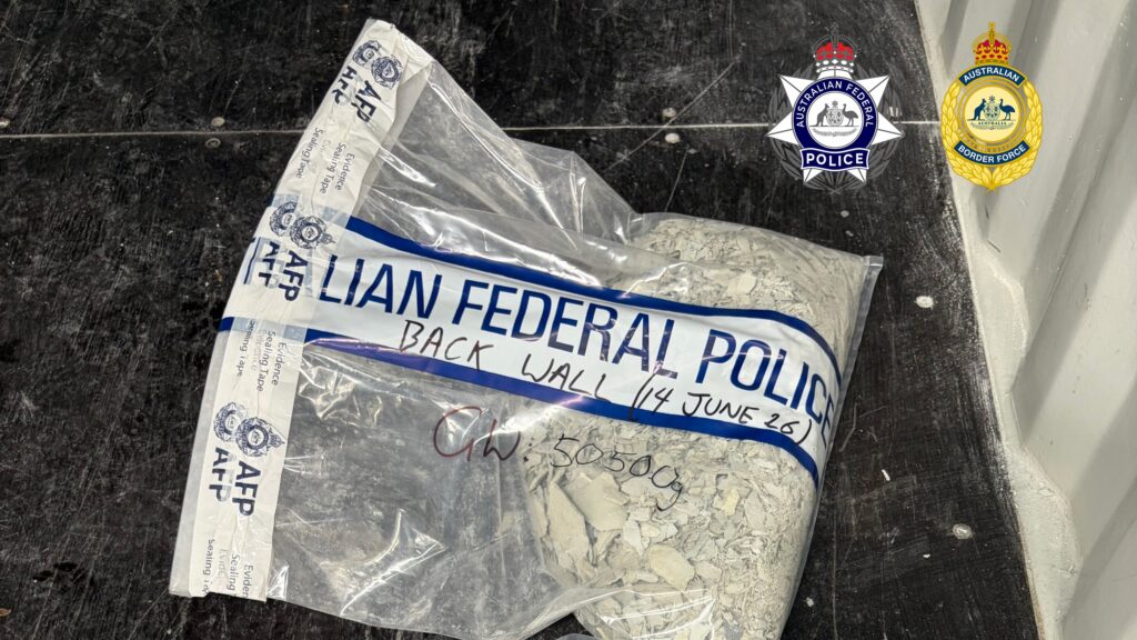 Mexican ... Some of the meth-infused paint scrapings as an AFP forensic team inspected the container. Photo: AFP/ABF