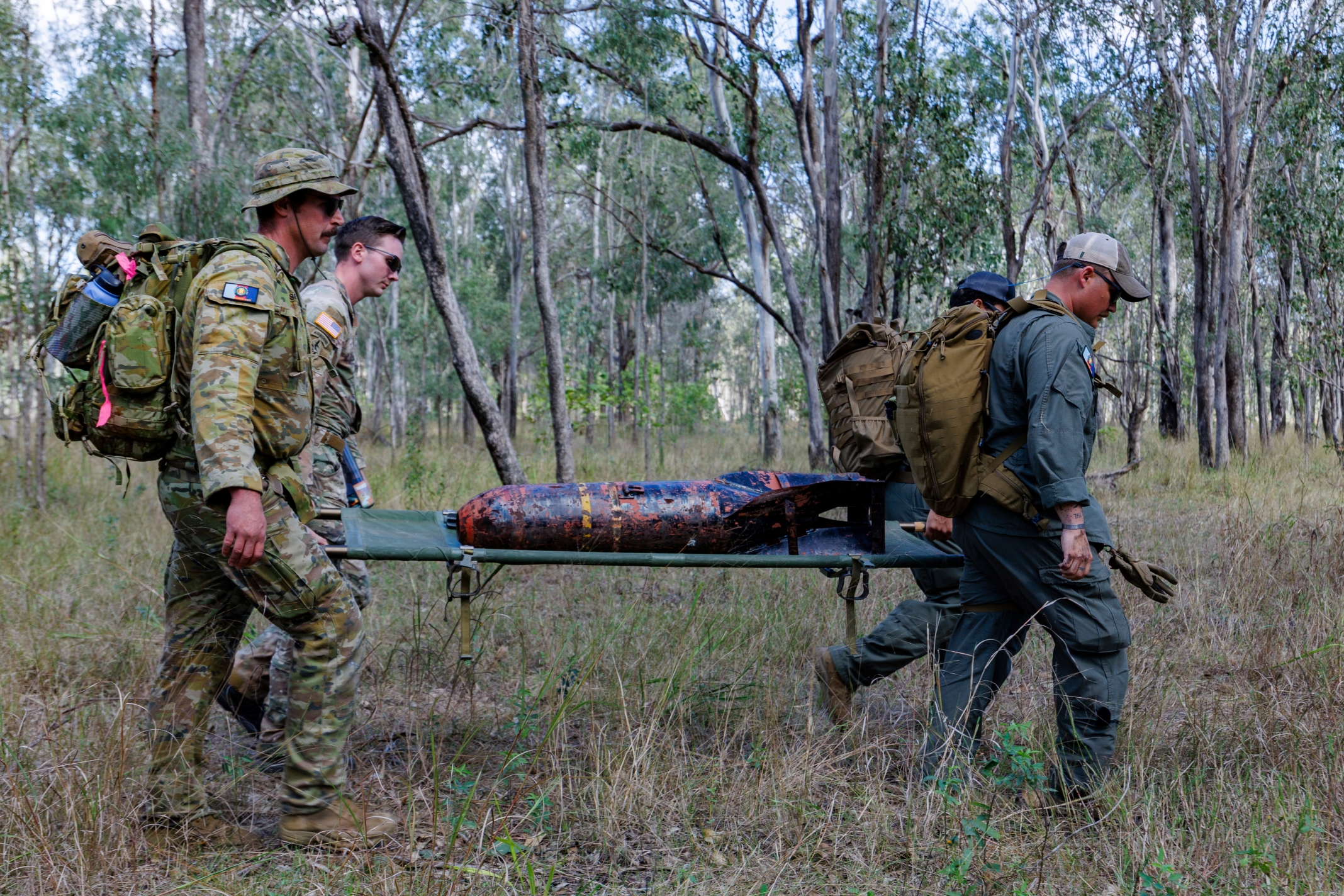 WW2 ... ADF personnel train in bushland around RAAF Amberley base before they headed to East New Britain, PNG. Photo: Department of Defence