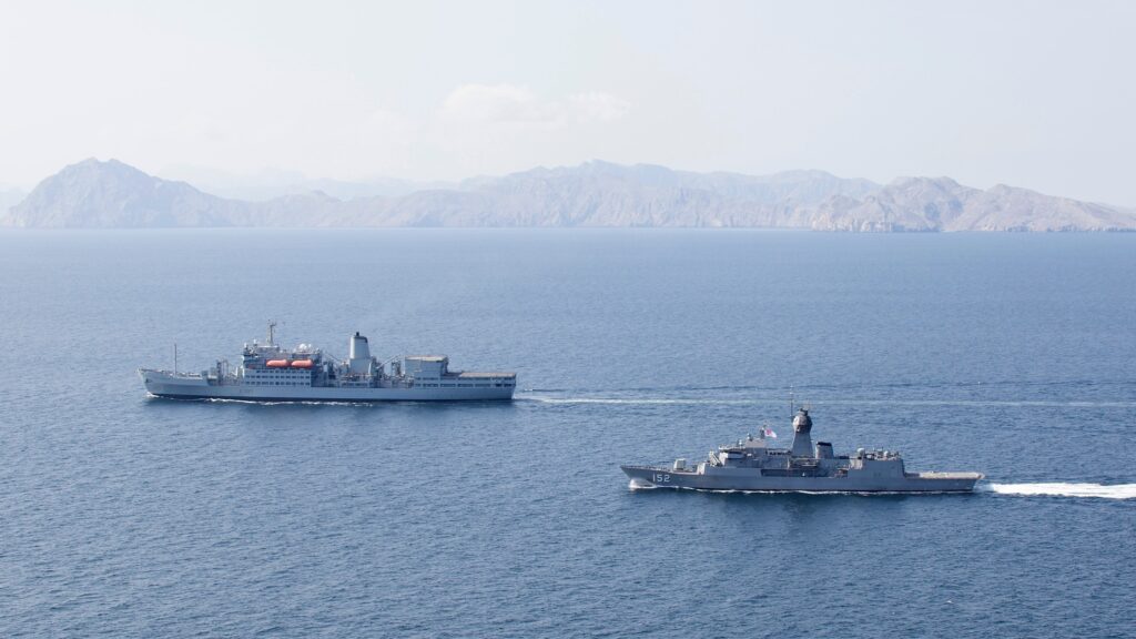 Fuel ... The HMAS Warramunga (right) escorts the RFA Fort Rosalie (UK) through the Strait of Hormuz during a 2017 deployment. Photo: Department of Defence.