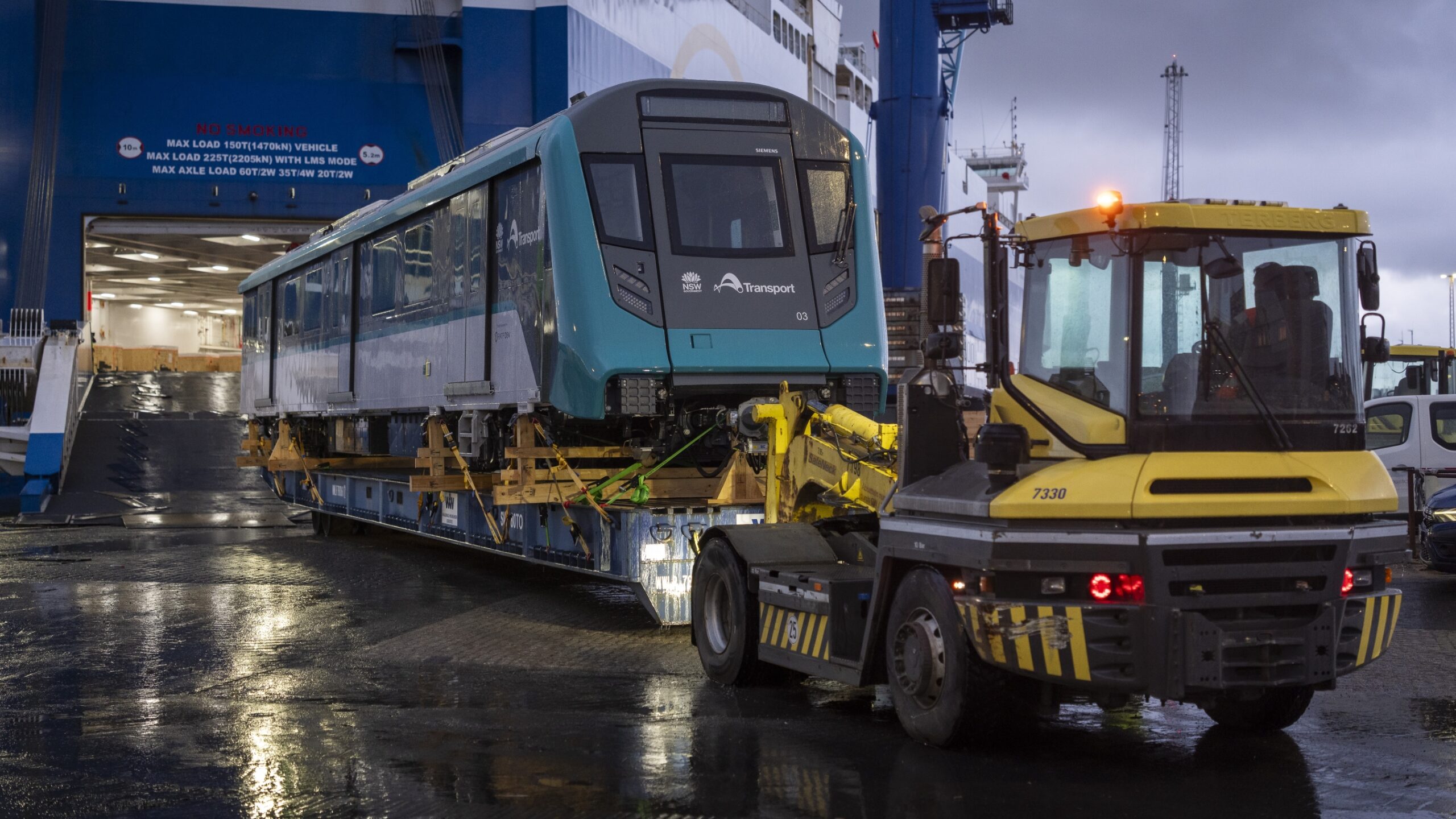 The first of the driverless trains is loaded in Europe. Each carriage is 30cm wider than current M1 trains. Photo: supplied
