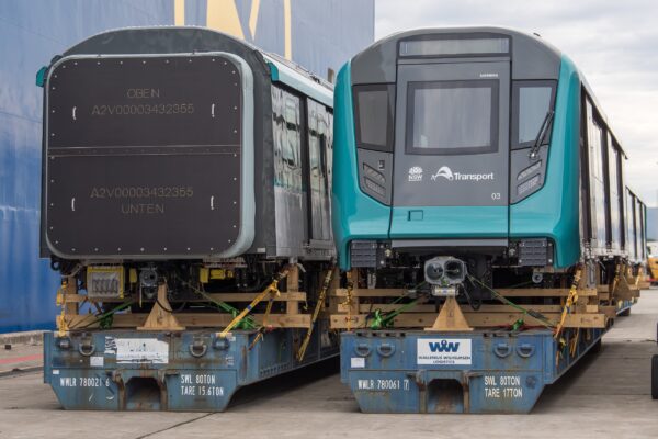 The train being loaded in Europe and unloaded in Sydney. Photos supplied.