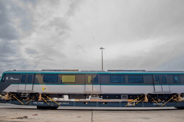 The train being loaded in Europe and unloaded in Sydney. Photos supplied.