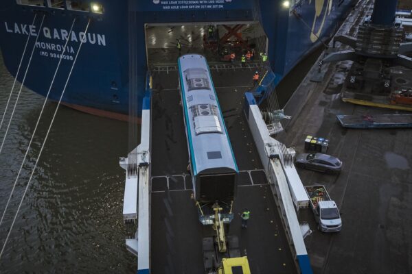 The train being loaded in Europe and unloaded in Sydney. Photos supplied.