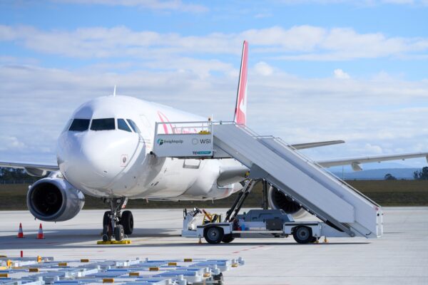 Australia Post had the first freight to fly out of the new airport.