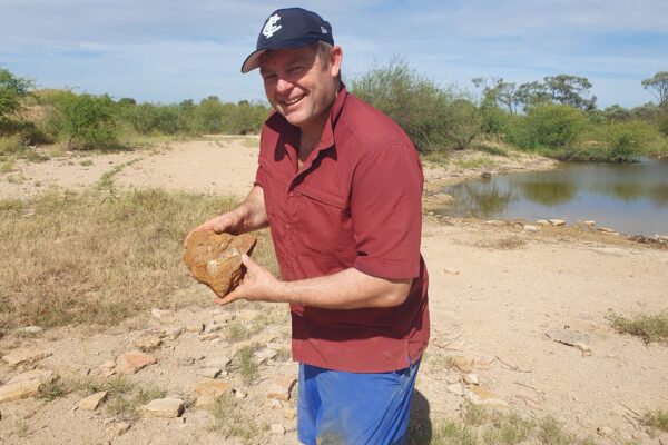 frozen ... Matt White with a fossil from the pterosaur. Photo: supplied