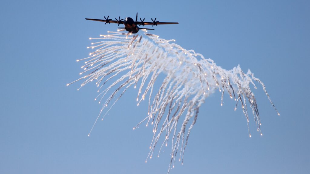 A RAAF Hercules displays its defensive flares at the 2014 Pacific Airshow on Surfers Paradise. Photo: ANDREW KACIMAIWAI