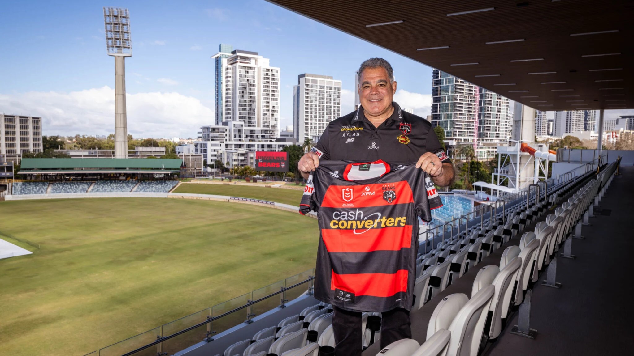 Mal Meninga shows Perth's new jersey during the unveiling ceremony in Perth. Photo: Perth Bears