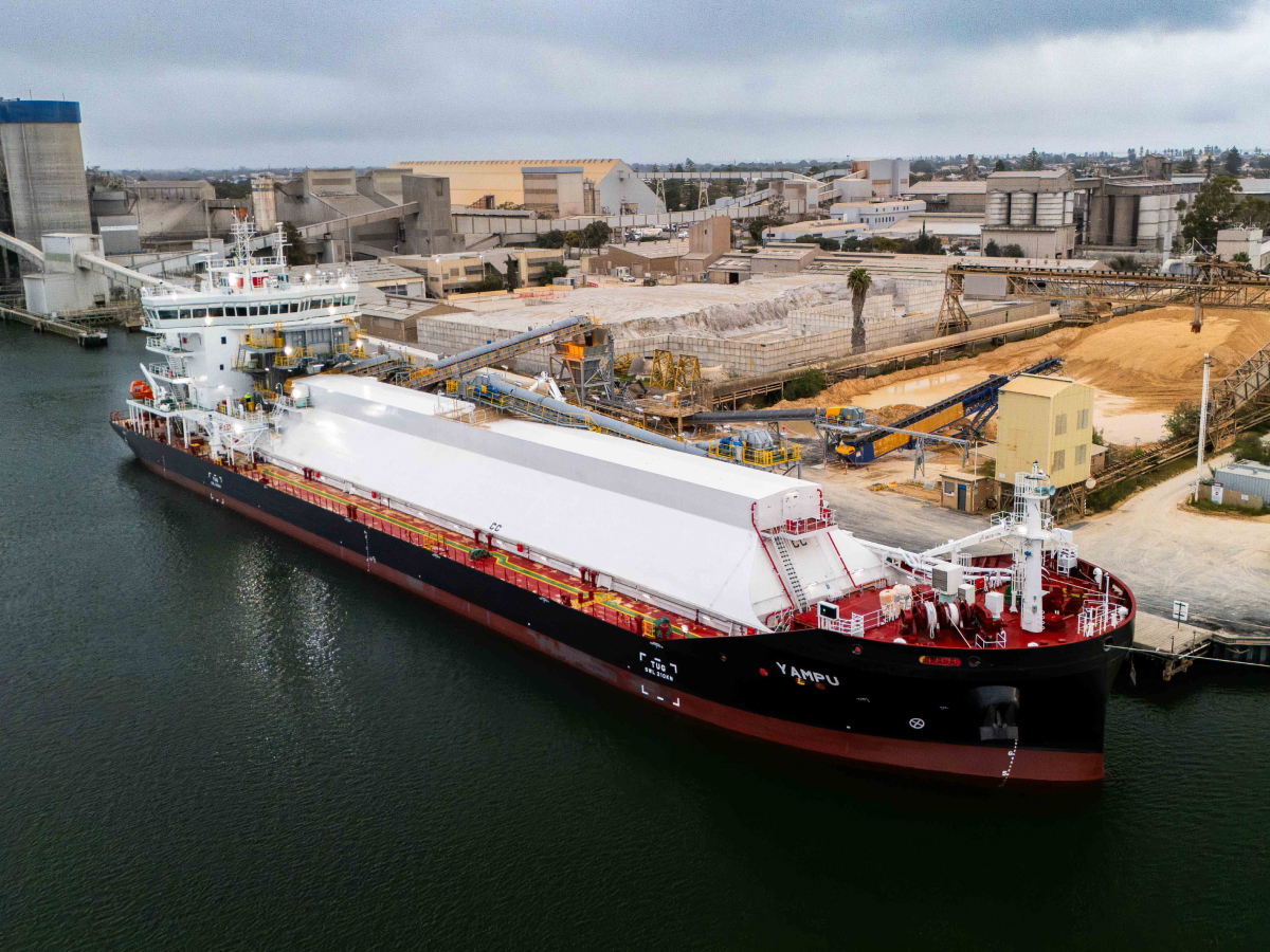 The battery-powered MV Yampu unloads its inaugural limestone cargo at Birkenhead, South Australia. Photo: supplied