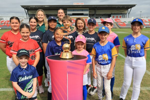 Softball Australia athletes, CEO and players from Redcliffe Leagues Softball Association at the trophy reveal.