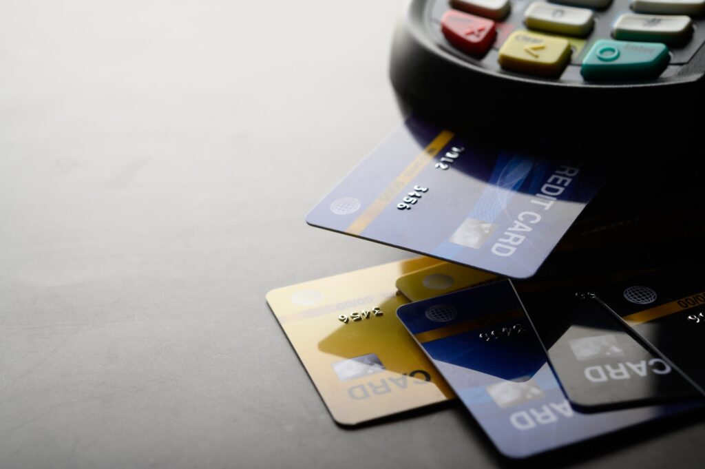 ATO credit card payments: credit cards beside a payment terminal