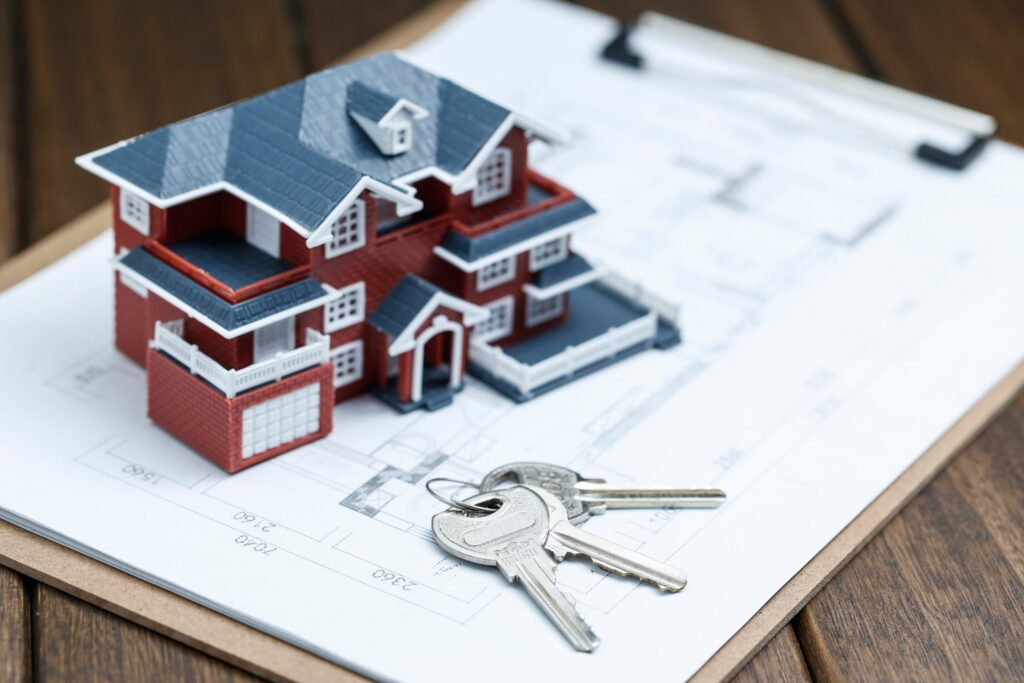 Model house and keys on a floor plan, Victoria rental reforms